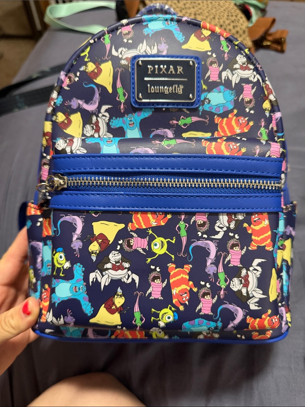 Loungefly Navy Pixar Monsters Pattern Mini Backpack with Blue Trim